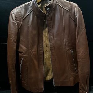Women’s Brown / cognac lamb skin Leather Jacket never worn Small. Zippers